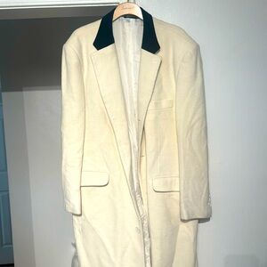 This a man overcoat that is ankle length. It is a 42R.